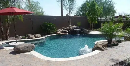 Renovated Cutom-Shaped Pool in Chandler Featuring A Rock Waterfall