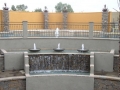 Tempe swimming pool with an alternative water feature by True Blue Pools