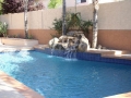 Homepage Features 9 — water fountain feature on a custom pool remodel by True Blue Pools