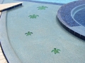 Homepage Features 1 — custom Tempe pool remodel with sea-turtle tile artwork and waterfall by True Blue Pools