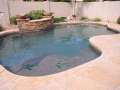 Turtle mosaic beside a waterfall in a Mesa pool remodel by True Blue Pools (6)