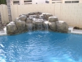 Custom waterfall pool remodel in Mesa by True Blue Pools