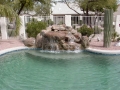 Custom waterfall and water-fountain pool remodel in Tempe by True Blue Pools