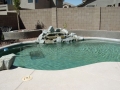 Custom rock waterfall pool remodel in Tempe by True Blue Pools