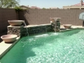 Custom scupper water fountain on a Mesa swimming pool by True Blue Pools