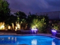 Finished pool with sheer descent waterfall feature by True Blue Pools