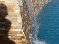 Custom Phoenix waterfall pool with sheer descent water feature by True Blue Pools