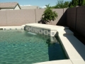 Mesa custom pool remodel with tile, waterfall and sheer descent water feature by True Blue Pools