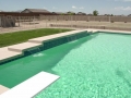 Gilbert custom pool remodel with tile detail and sheer descent water feature by True Blue Pools