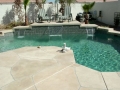 Gilbert custom pool remodel with waterfall and sheer descent water feature by True Blue Pools
