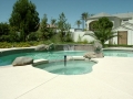 Sheer descent water feature on a custom Gilbert pool remodel by True Blue Pools