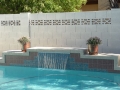 Mesa custom pool waterfall remodel with sheer descent water feature by True Blue Pools