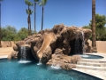 Custom spa with waterfalls and slide — True Blue Pools (18)
