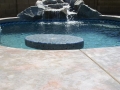 Phoenix pool remodel featuring custom in-pool table and stool seating by True Blue Pools